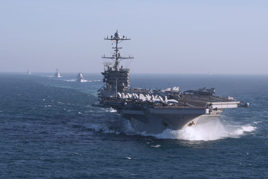 USS Harry S. Truman (CVN 75) and ships assigned to the Harry S. Truman Carrier Strike Group (HSTCSG) transit the Atlantic Ocean while conducting composite training unit exercise (COMPTUEX). Truman is underway for COMPTUEX, which evaluates the strike group's ability as a whole to carry out sustained combat operations from the sea, ultimately certifying the Harry S. Truman Carrier Strike Group for deployment. (U.S. Navy photo by Mass Communication Specialist 2nd Class Scott Swofford/Released)