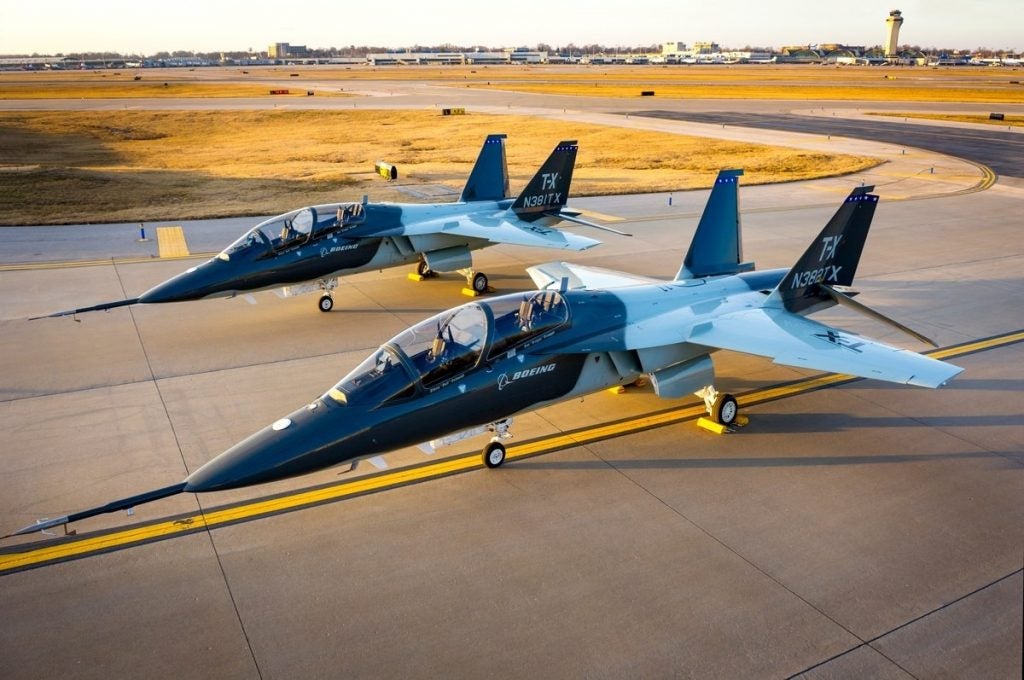 Two Boeing T-X aircraft parked on a taxiway (photo courtesy of U.S. Air Force Secretary of Public Affairs)