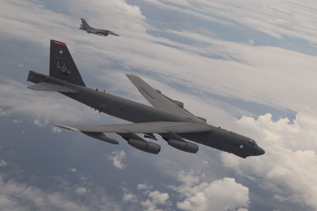 A U.S. Air Force B-52 Stratofortress assigned to the 2nd Bomb Wing, Barksdale Air Force Base, Louisiana, flies next to an Indonesian Air Force F-16 during a Bomber Task Force (BTF) deployment in the Indo-Pacific region, Sept. 1, 2021. This is the first time a B-52 has integrated with the Indonesian Air Force during flight. BTF missions demonstrate the credibility of our forces to address a diverse and uncertain security environment. (Courtesy Photo of Indonesian Air Force)