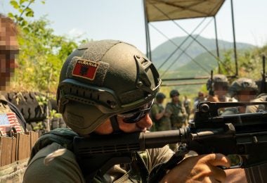 A U.S. Army Green Beret assigned to 10th Special Forces Group observes Close-Quarter-Battle drills conducted by the Albanian Special Forces, Albania, July 21, 2021. Joint Combined Exchange Training enhances interoperability with Partner Nations and strengthens military readiness, teamwork and joint confidence while promoting peace and stability in Europe. (U.S. Marine Corps photo by Sgt. Devin J. Andrews)