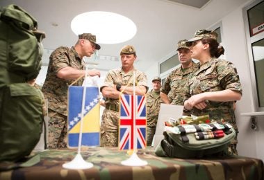 Bosnian and British flags are seen on a table during a visit by British Army Deputy Chief of Staff Colonel General Charles R V Walker DSO to the Bosnia and Herzegovinian Armed Forces (British Embassy Sarajevo)