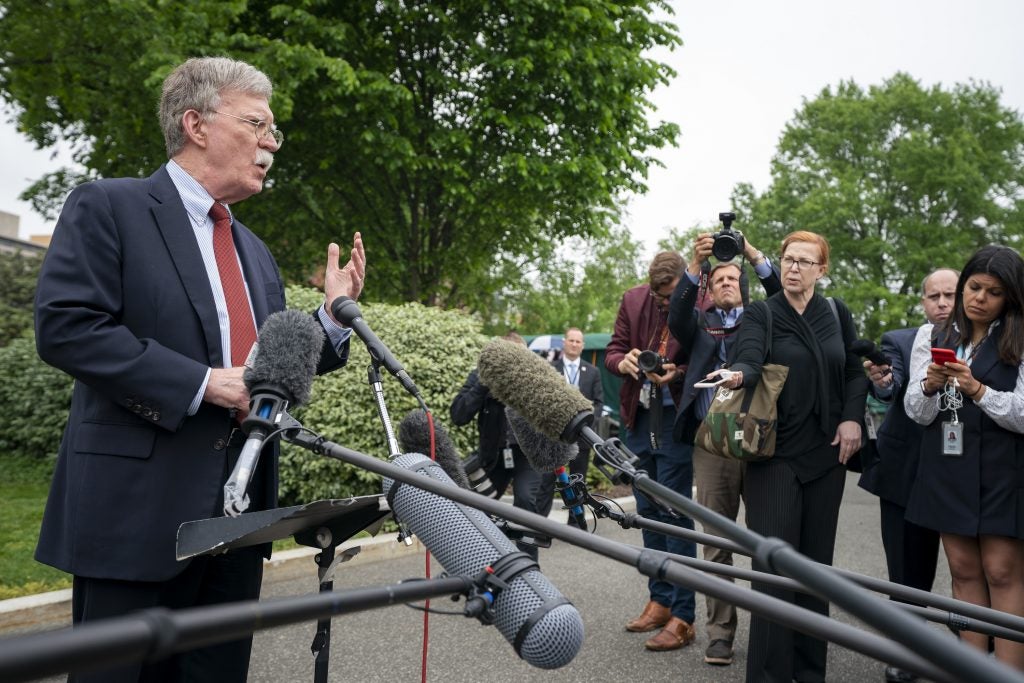 White House National Security Advisor Ambassador John Bolton talks to reporters Wednesday, May 1, 2019, outside the West Wing entrance of the White House. (Official White House Photo by Tia Dufour)