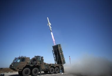 A current-generation Type 12 missile system fires