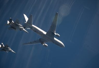 A U.S. Air Force KC-46A Pegasus assigned to the 22nd Air Refueling Wing at McConnell Air Force Base, Kansas refuels U.S. Air Force F-15C Eagle from the 67th Fighter Squadron while participating in Exercise WestPac Rumrunner, out of Kadena Air Base, Japan, Oct. 16, 2020. This was the first time the 18th Wing conducted KC-46 air refueling operations of Kadena Air Base F-15s. (U.S. Air Force photo by Tech. Sgt. Daniel E. Fernandez)