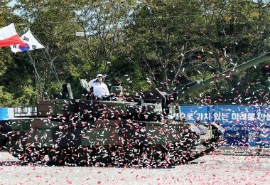 Confetti flies during Hyundai Rotem's "Gap Filler" ceremony rolling out the first 10 K2 main battle tanks for Poland (Hyundai Rotem/Korea Defense Blog)