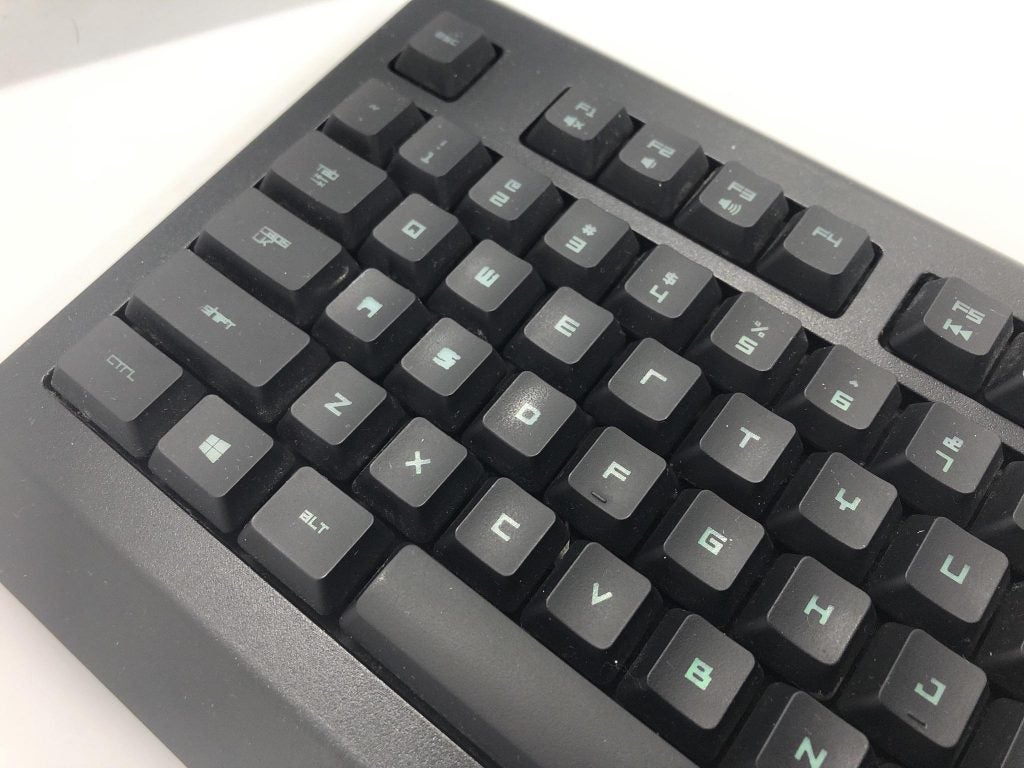 A Razer Cynosa Pro membrane keyboard with signs of wear from use (Albert Lee for Overt Defense)