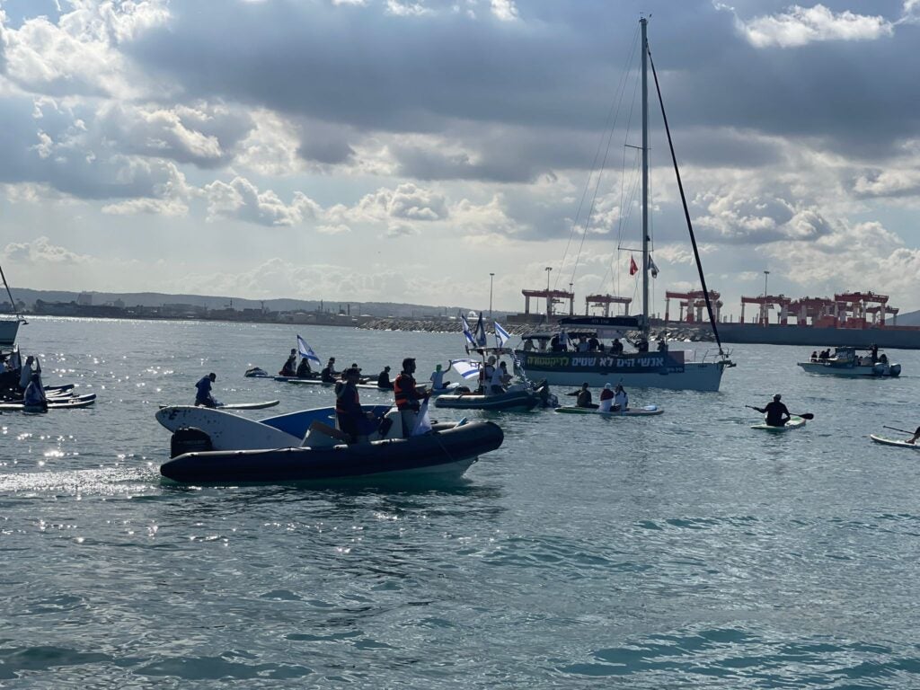 Protesters including IDF naval reservists against judicial reforms proposed by Israeli Prime Minister Benjamin Netanyahu form a flotilla at the port of Haifa March 9.