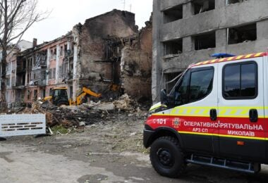 Ukraine State Emergency Service firefighters conducting search and rescue work on July 20 at a building in Mykolaiv destroyed in a Russian attack the night before (State Emergency Service of Ukraine)