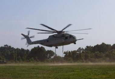 U.S. Marines with Marine Heavy Helicopter Squadron (HMH) 461 practice external lifts with a CH-53K King Stallion at Marine Corps Base Camp Lejeune, North Carolina, Aug. 15, 2023. HMH-461 took part in Large Scale Exercise 2023, a globally integrated exercise designed to refine how we synchronize maritime operations across multiple fleets in support of the joint force. The training was based on a progression of scenarios that will assess and refine modern warfare concepts. HMH-461 is a subordinate unit of 2nd Marine Aircraft Wing, the aviation combat element of II Marine Expeditionary Force. (U.S. Marine Corps photo by Lance Cpl. Orlanys Diaz Figueroa)