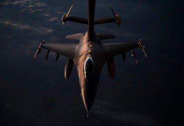 A U.S. Air Force F-16 Fighting Falcon assigned to the 77th Expeditionary Fighter Squadron, approaches a KC-10 Extender assigned to the 908th Expeditionary Air Refueling Squadron, to receive fuel, within the U.S. Central Command area of responsibility, Feb. 13, 2023. The 908th EARS delivers fuel for U.S. and partner nation forces, extending the reach and combat airpower dominance to the region. (U.S. Air Force photo by Tech. Sgt. Daniel Asselta)