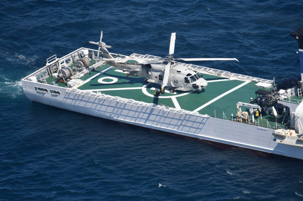 A Japan Maritime Self-Defense Force SH-60K Seahawk aboard a Japan Coast Guard ship during an exercise between the two services (Japan Maritime Self-Defense Force)