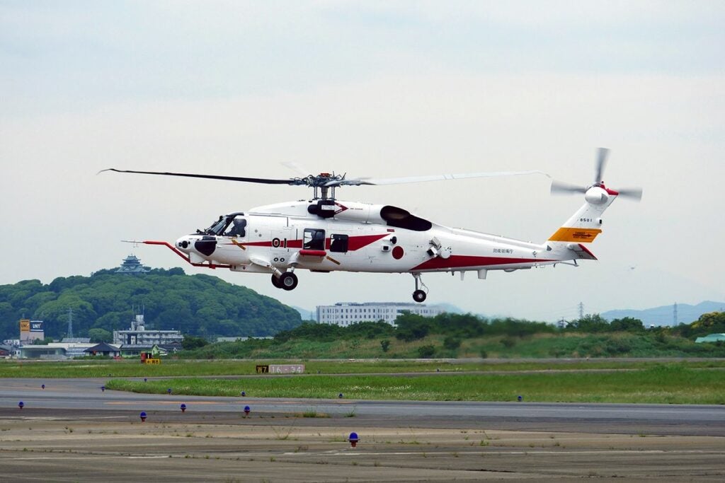 An XSH-60L prototype hovers during a flight test (Mitsubishi Heavy Industries)