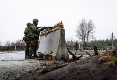 Estonian soldiers at a concrete barrier fortification (Estonian Defense Ministry)