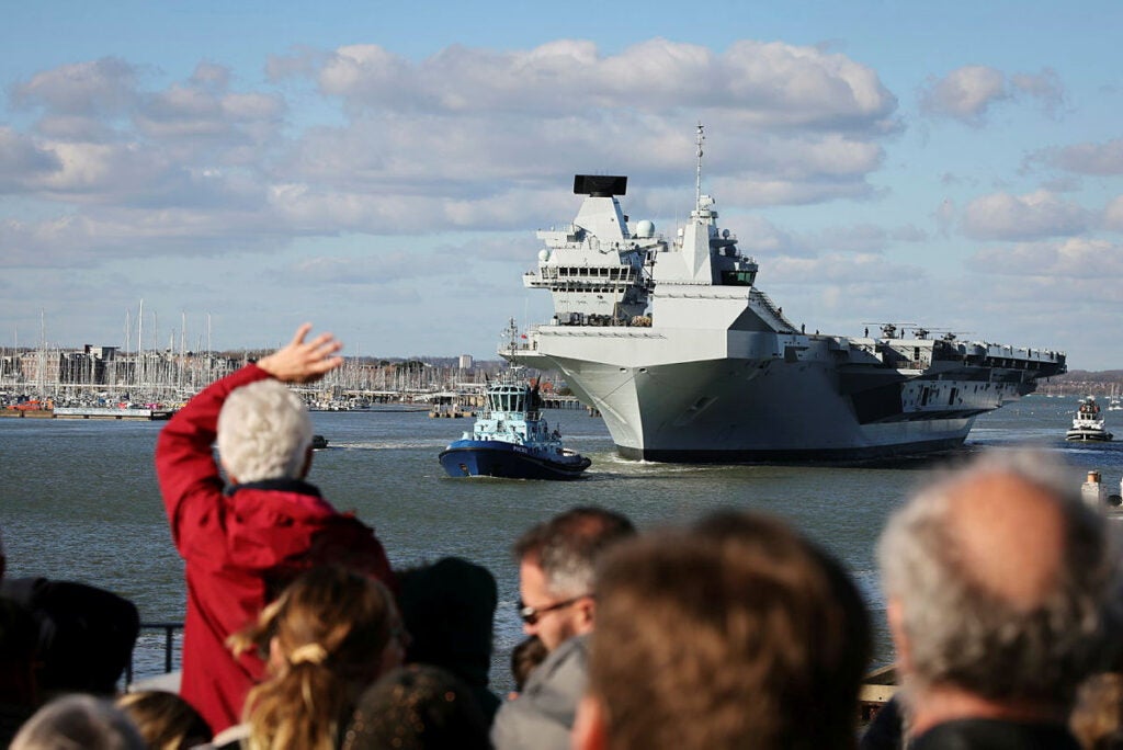 Families wait on the Round Tower as HMS Prince of Wales leaves to deploy on Exercise Steadfast Defender. On the 12th of February 2024 HMS Prince of Wales (R09) one of the Royal Navy's Aircraft Carriers left its homeport in Portsmouth to take part in NATO Exercise Steadfast Defender working with NATO Partners off the coast of Norway.