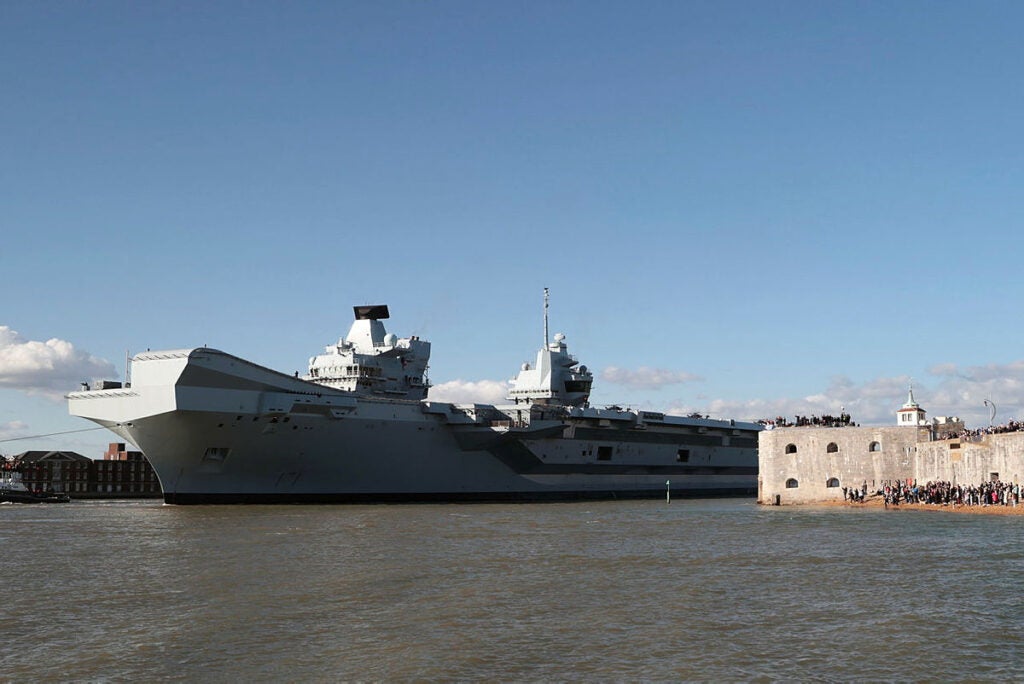 HMS Prince of Wales sails past the Round Tower as she deploys for Exercise Steadfast Defender (Crown Copyright)