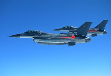 Two Danish F-16s integrate with a U.S. B-52H Stratofortress, assigned to the 2nd Bomb Wing, Barksdale Air Force Base, Louisiana, out of Morón Air Base, Spain, in support of Bomber Task Force Europe May 21, 2021. U.S. European Command enjoys mutually beneficial military cooperation with our Nordic allies and partner countries with respect to the Arctic region, constantly coordinating together on operations and exercises. (U.S. Air Force photo by Tech. Sgt. Jael Laborn)