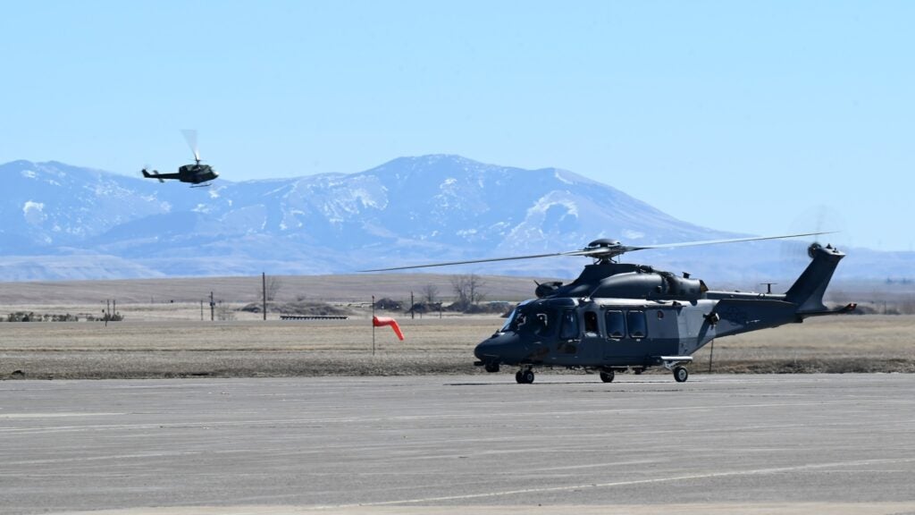 A MH-139 Grey Wolf at Malmstrom Air Base, Montana, with a UH-1N in the background (U.S. Air Force photo by Staff Sgt. Trevor Rhynes)