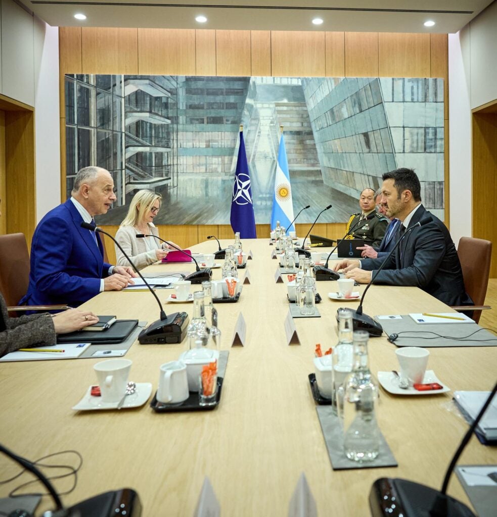 Argentine Defence Minister Luis Petri and NATO Deputy Secretary General Mircea Geoană in a meeting at NATO's Brussels headquarters on April 18 (Office of the Argentine Defence Minister)