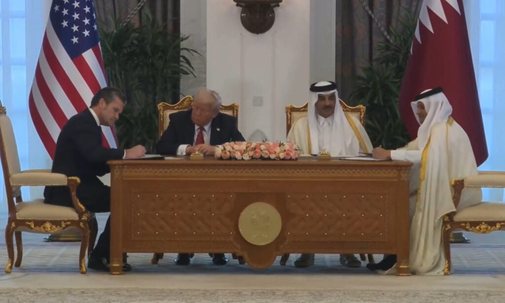 Secretary of Defense Pete Hegseth signs a statement of intent on US-Qatar military cooperation on May 14 (Department of Defense)
